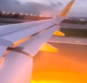 Panic as flames erupt from plane engine during take-off Passengers were stunned as flames burst from a plane's engine during takeoff at Barcelona's El Prat Airport, sparking an evacuation and an ongoing investigation into the cause.