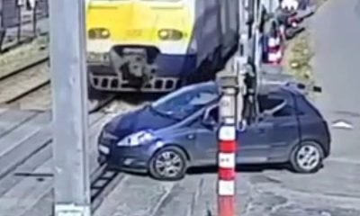 A train slammed into a car stuck on tracks in Liège after a wrong turn trapped it at a crossing—driver escaped just in time, causing chaos and commuter delays.